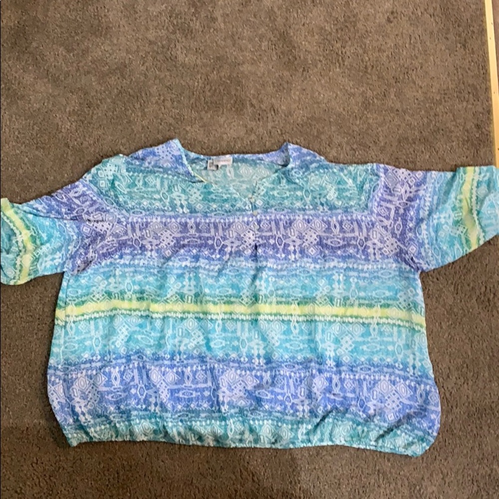 This is a blue blended 3/4 sleeve blouse